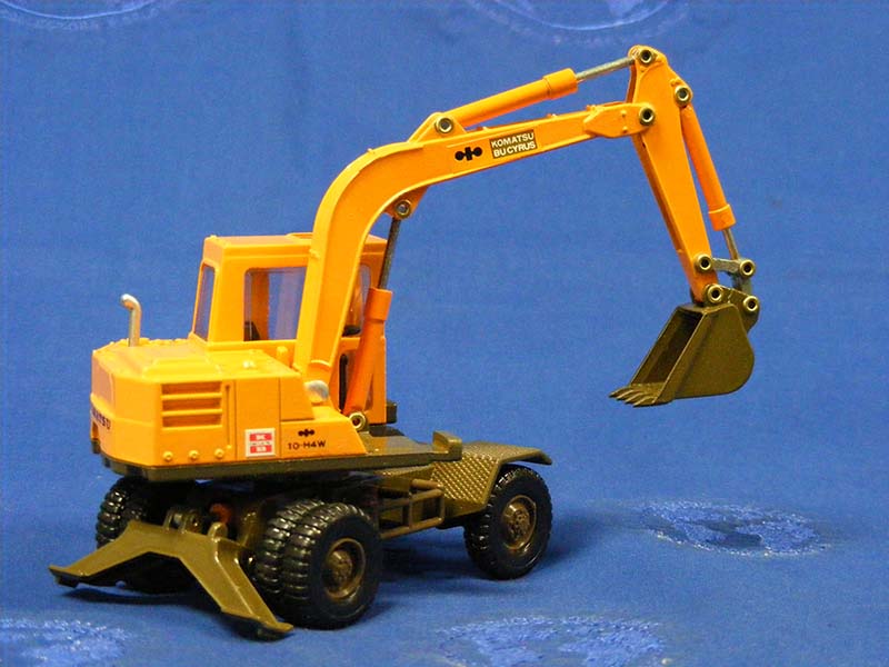 Excavadora De Ruedas Komatsu 10-H4W Escala 1:40 (Modelo Descontinuado)