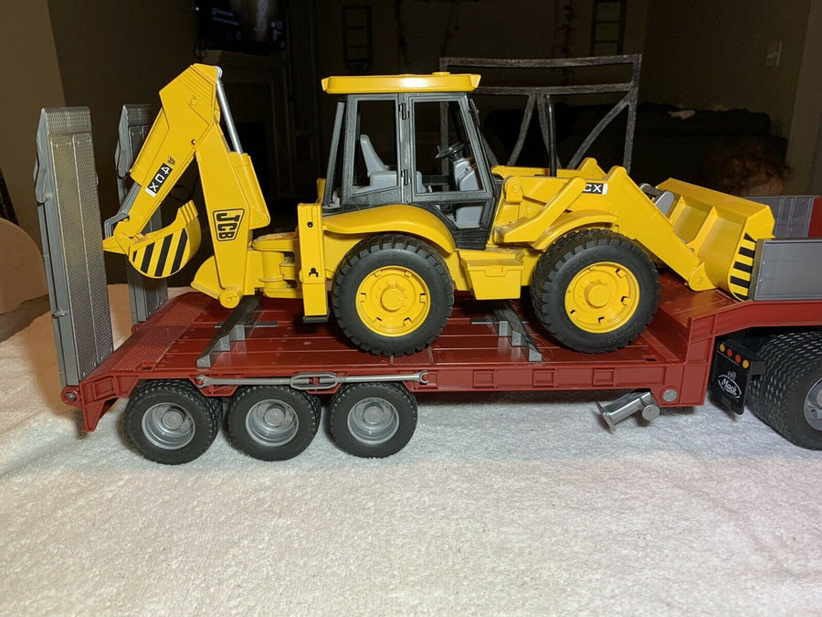 02813 Cama Baja Mack Granite & Retroexcavadora JCB Escala 1:16 - KATZER