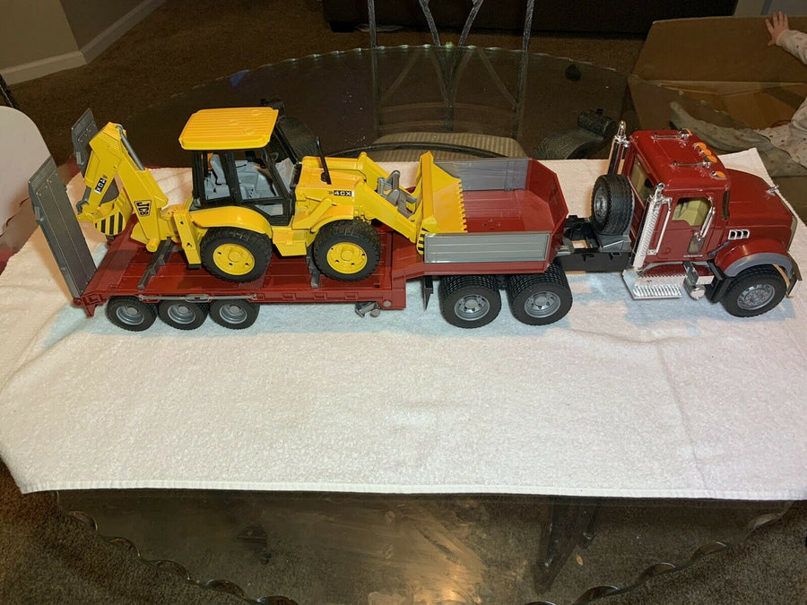 02813 Cama Baja Mack Granite & Retroexcavadora JCB Escala 1:16 - KATZER