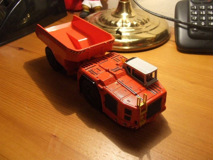 Scale Sandvik 2767 Sandvik TH663 Low Profile Mining Truck 1:50 Scale - CAT SERVICE ...