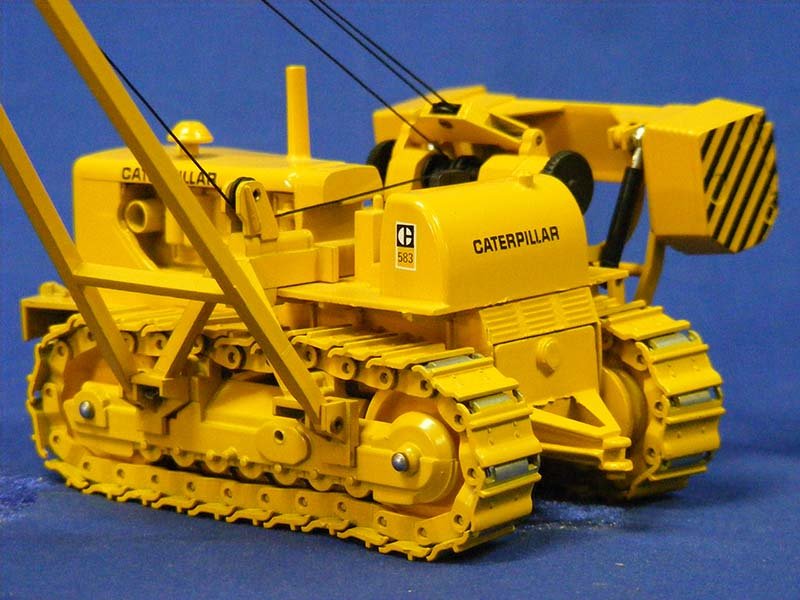 2875 Tractor Tiende Tubos Caterpillar 583 Escala 1:50 (Modelo Descontinuado) - KATZER