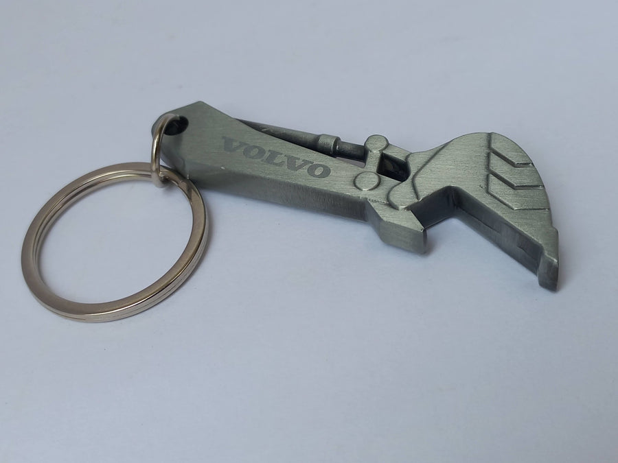 50-1401 Llavero Destapador en Forma de Brazo de Excavadora Volvo - KATZER