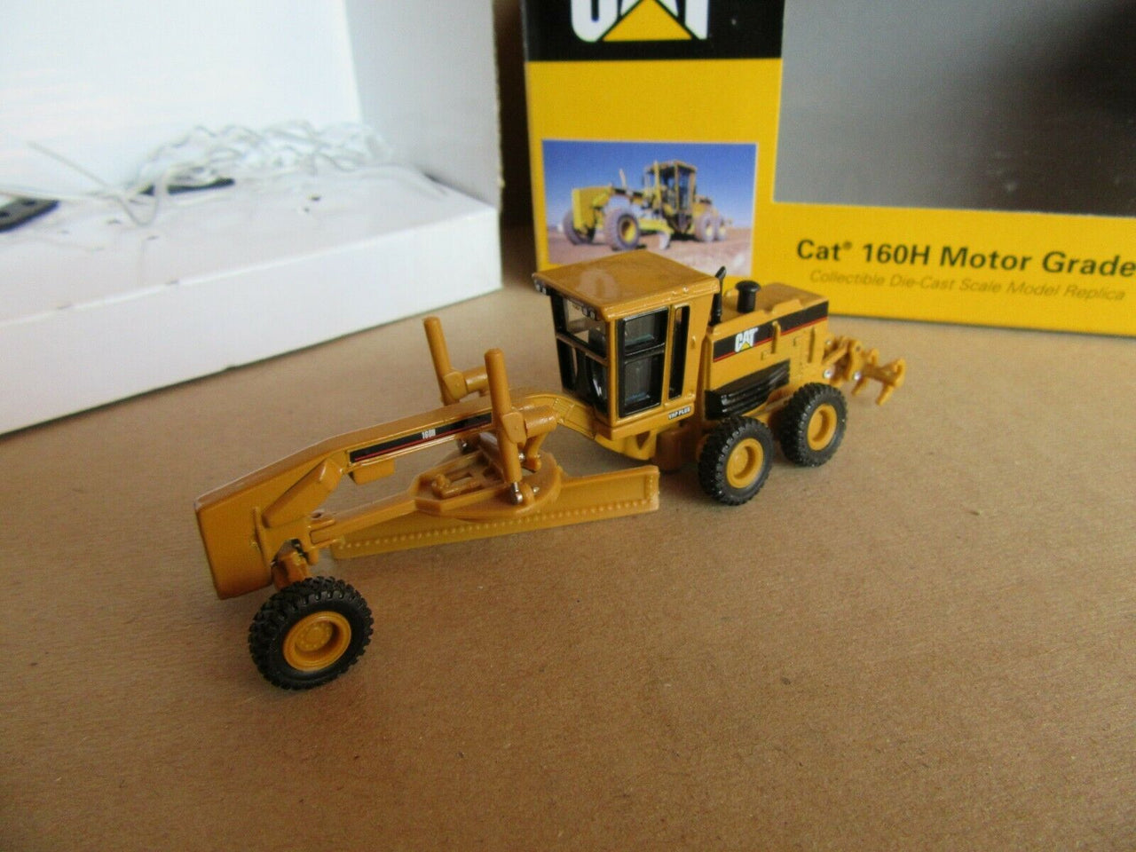 55127 Motoniveladora Cat 160H Escala 1:87