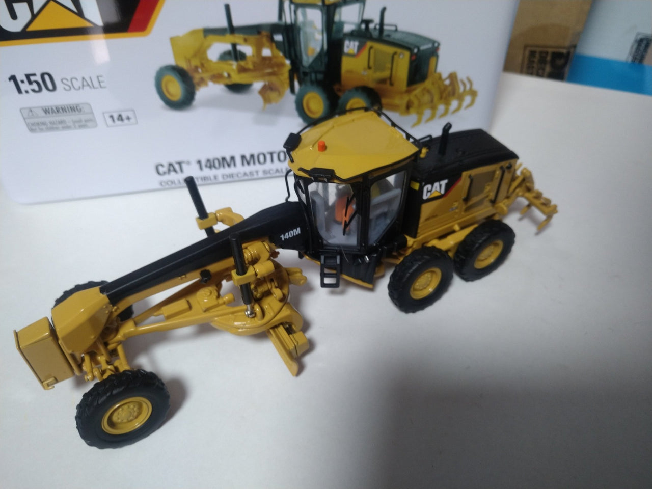 Motoniveladora  140M Escala 1:50 (Modelo Descontinuado)